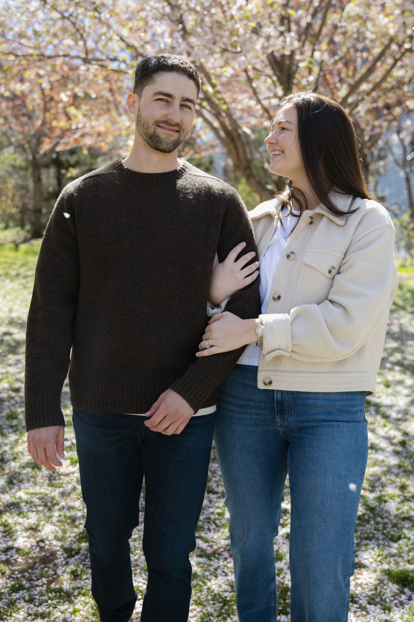 Taylor and Jake under cherry blossoms